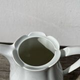 Plain white porcelain teapot