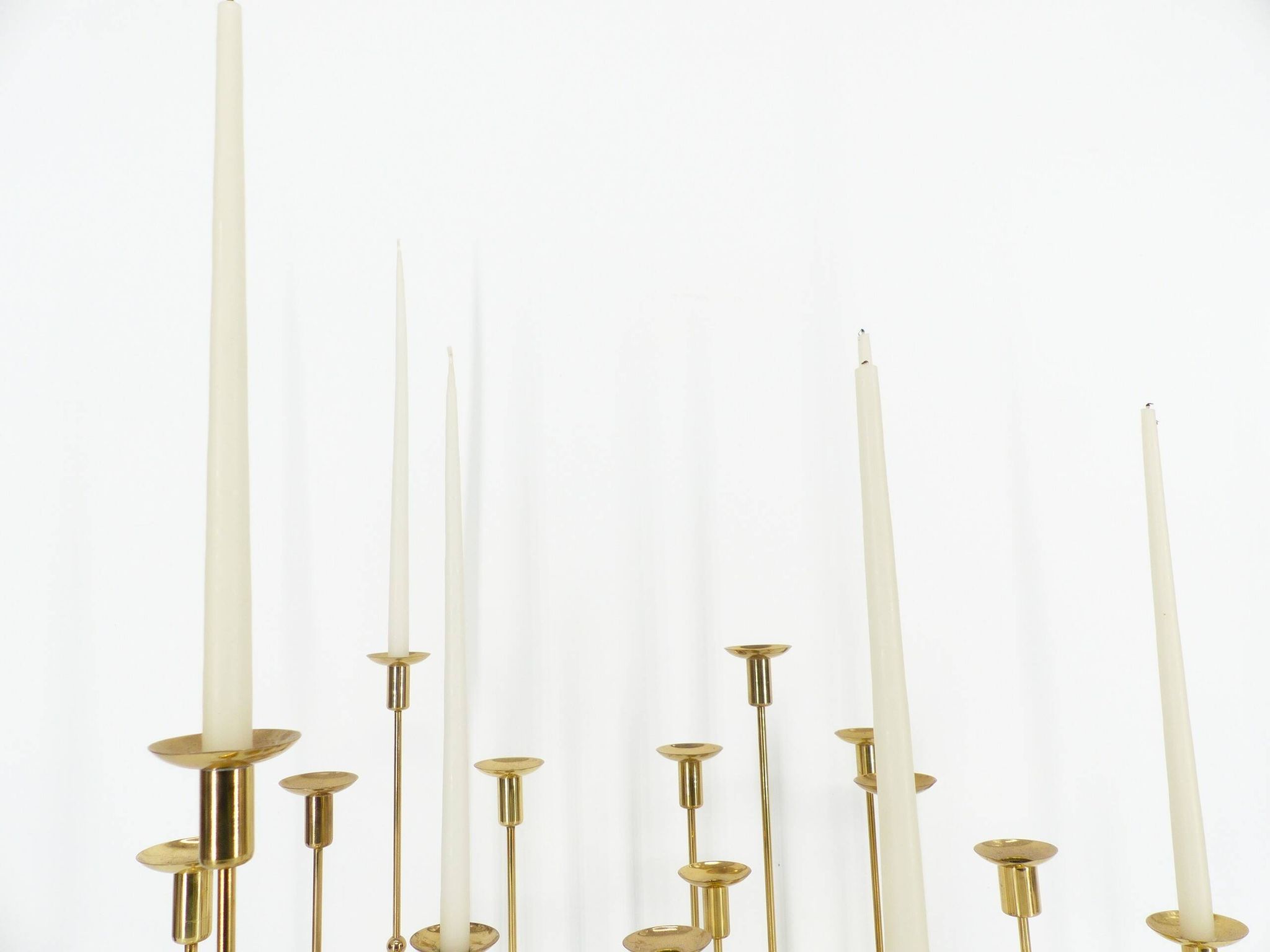 Set of 15 Scandinavian candle holders in brass and glass, Gunnar Ander, Ystad Met