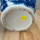 Blue and white Chinese vase with sculpted handles and landscape decoration.