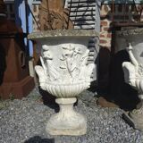 Medical vases with characters in reconstituted stone.