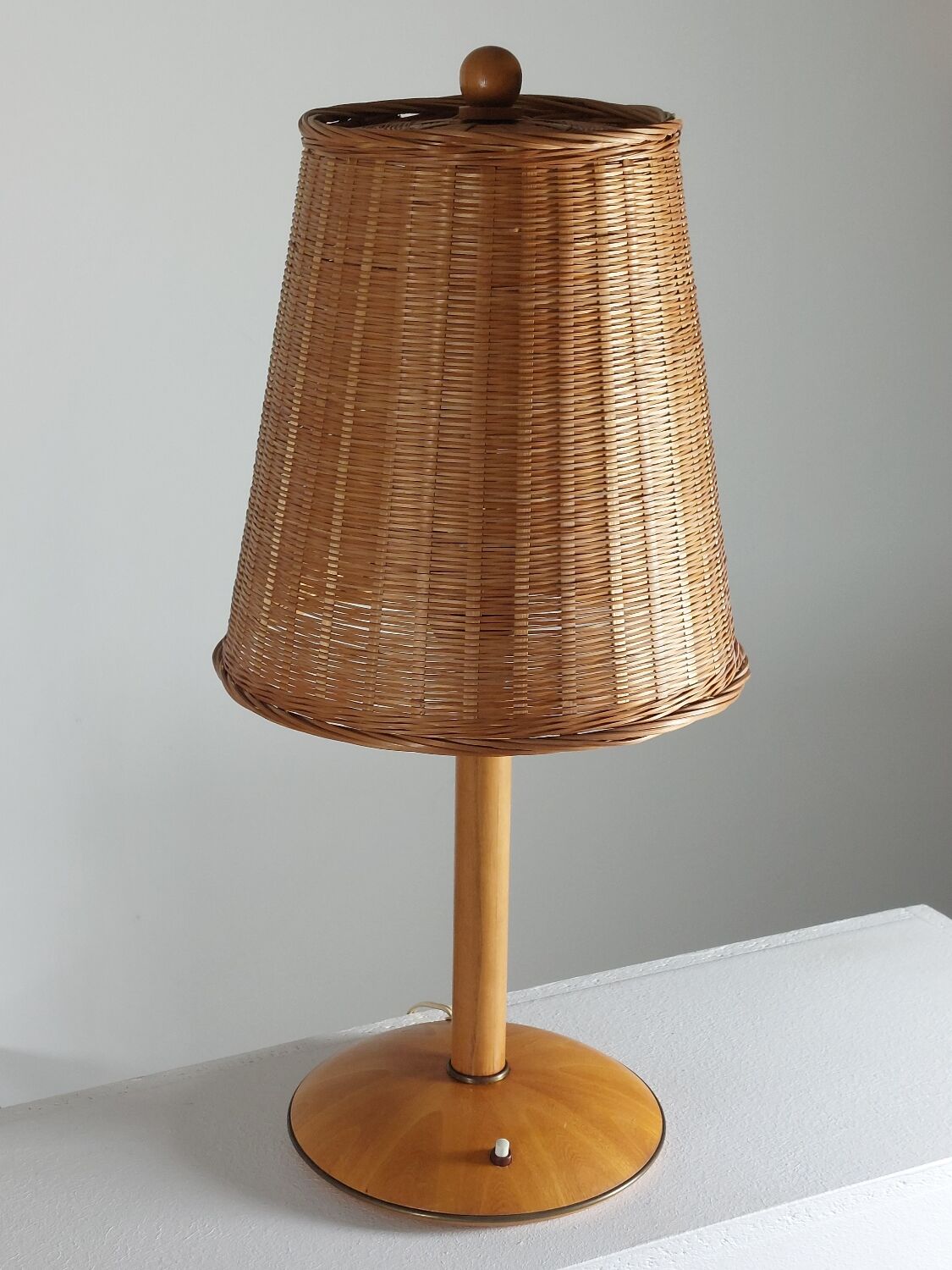 Vintage wooden and brass table lamp by Temde from the 1950s.
