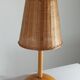 Vintage wooden and brass table lamp by Temde from the 1950s.