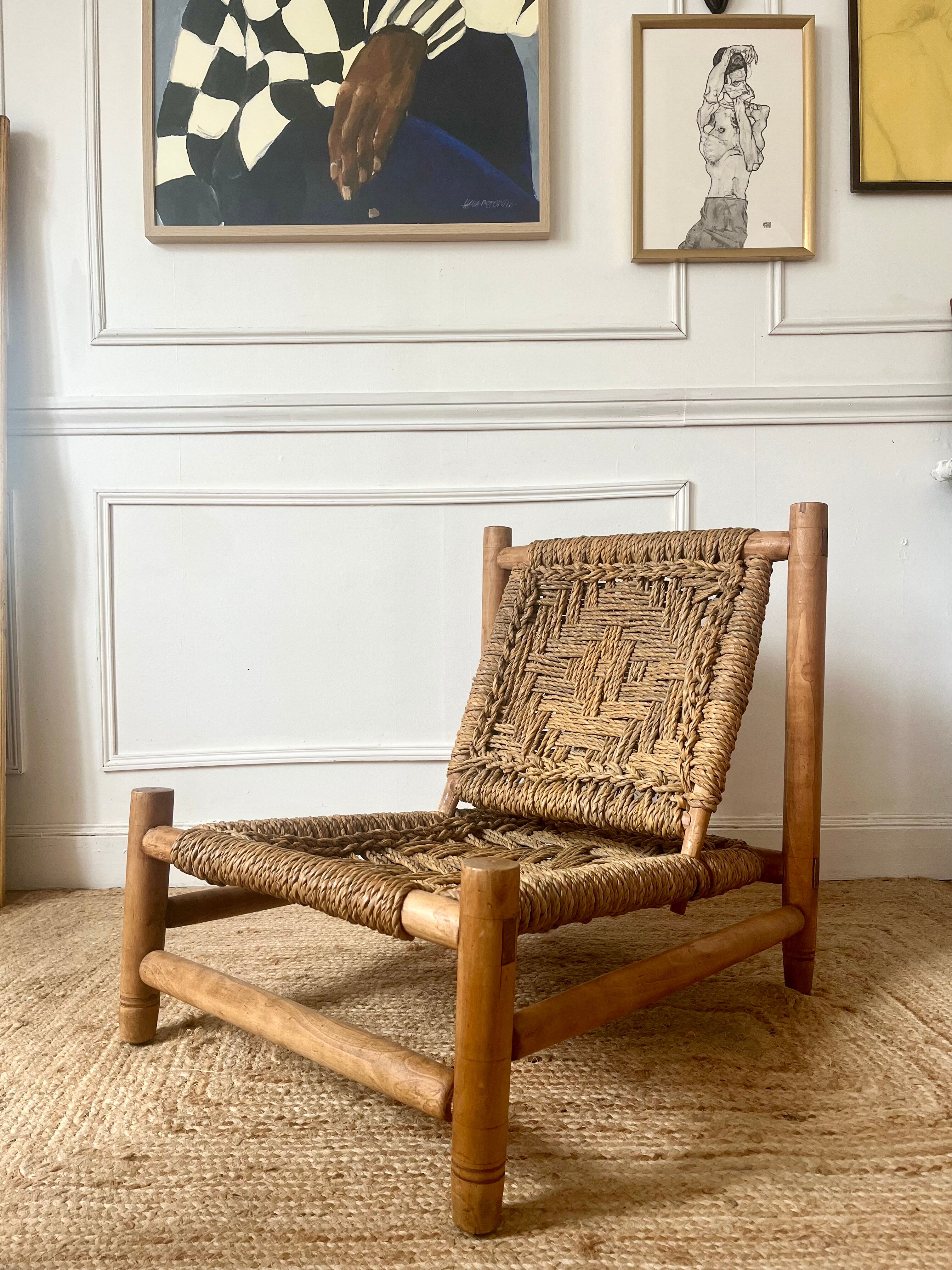 Wood and rope armchair by Audoux and Minnet from the 1950s.