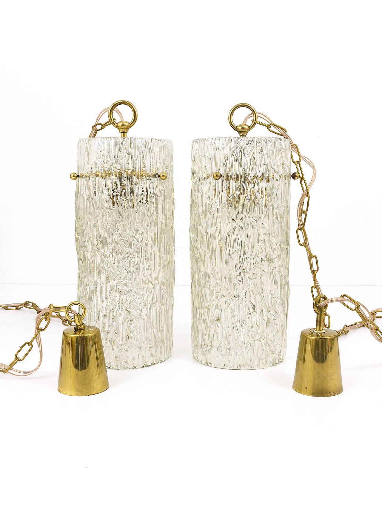 Two suspended lamps in glass and brass by J.T. Kalmar, Vienna, mid-century, Austria, 1950s.