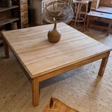 Large square antique coffee table made of raw solid wood.