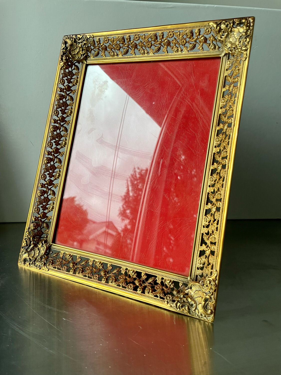 Antique xl metal frame in gold colored brass 29.5 cm x 23 cm convex glass