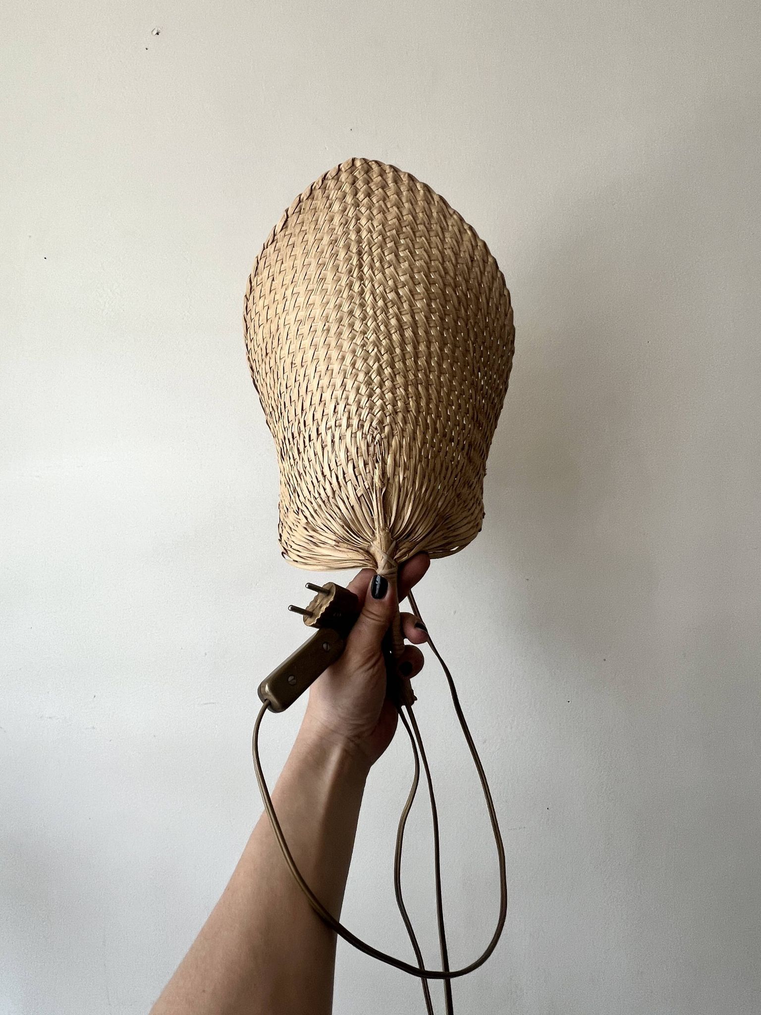 Woven rattan wall light in the style of Igno Maurer, design from the 1970s.