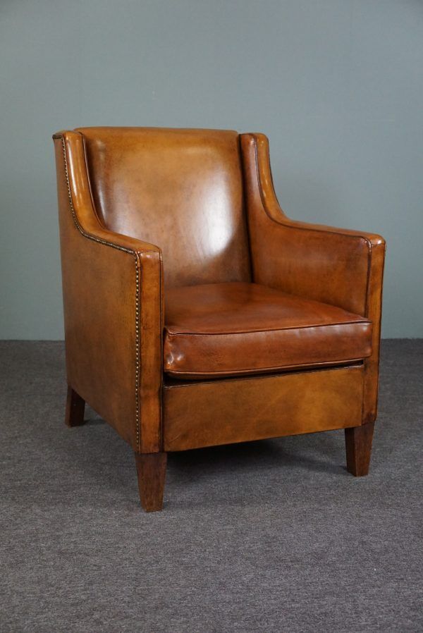 Modern charming armchair in sheepskin