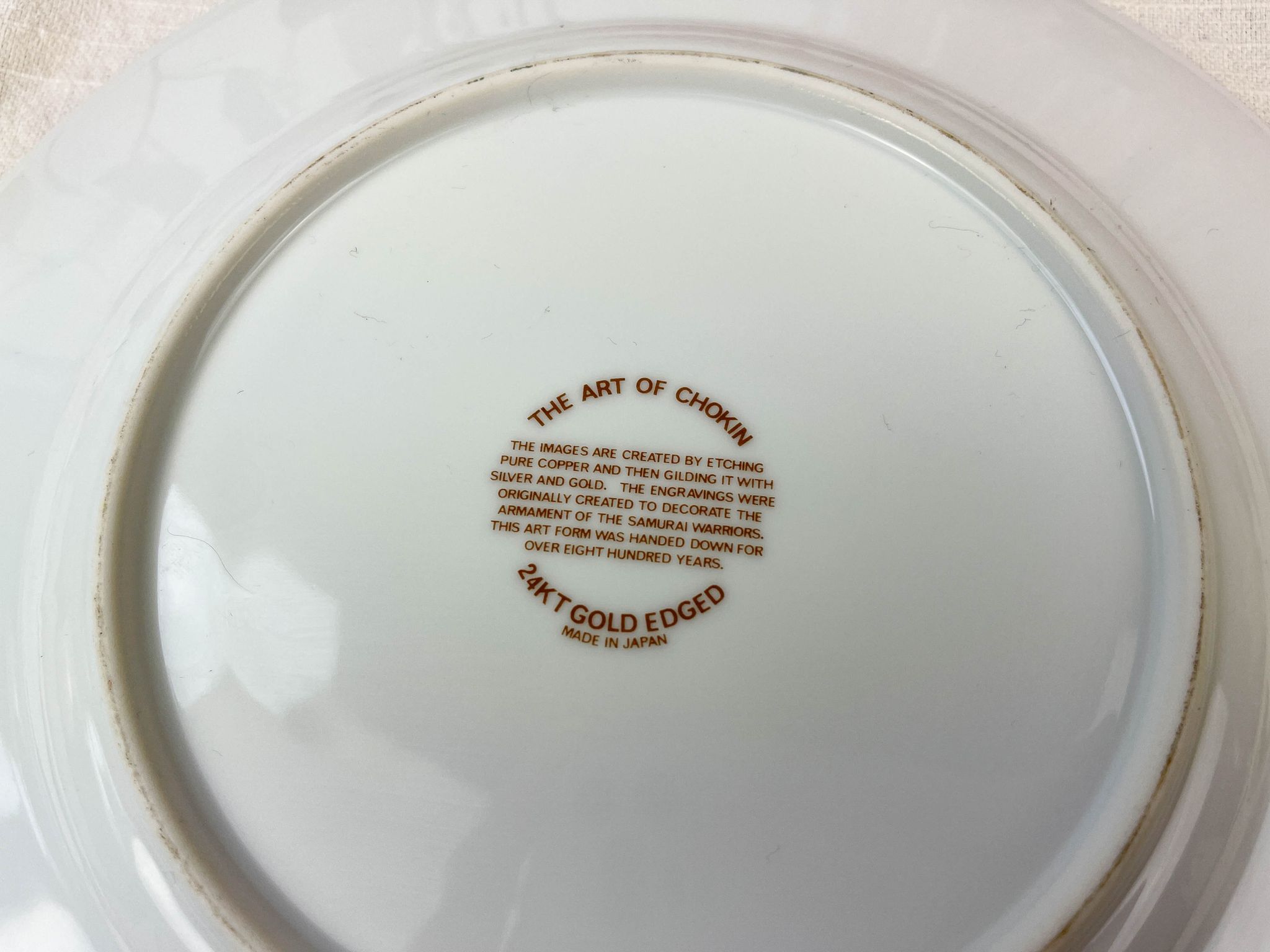 Decorative round porcelain dish "the art of chokin" made in japan