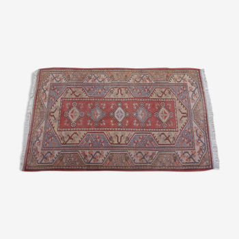 Tapis melas anatolian en laine à franges sur fond rose 208x120cm