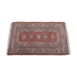 Rug melas Anatolian wool fringe on pink background 208x120cm