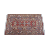 Rug melas Anatolian wool fringe on pink background 208x120cm