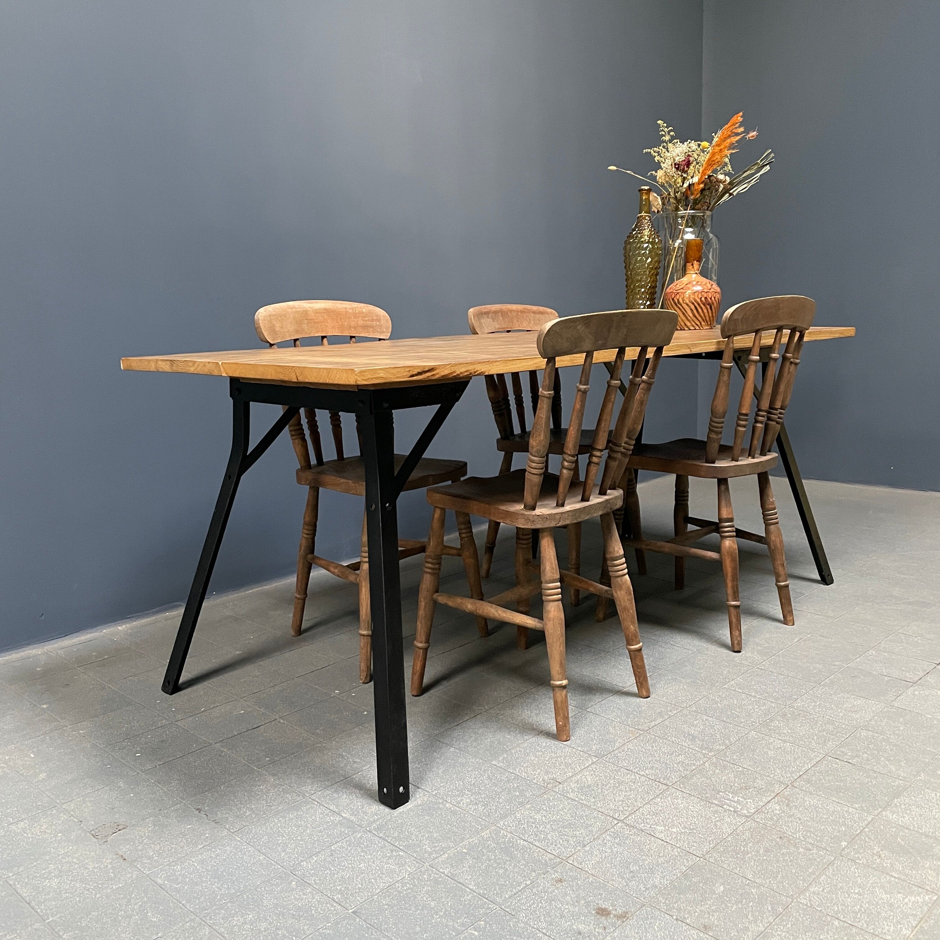 Handmade industrial oak dining table with black metal legs