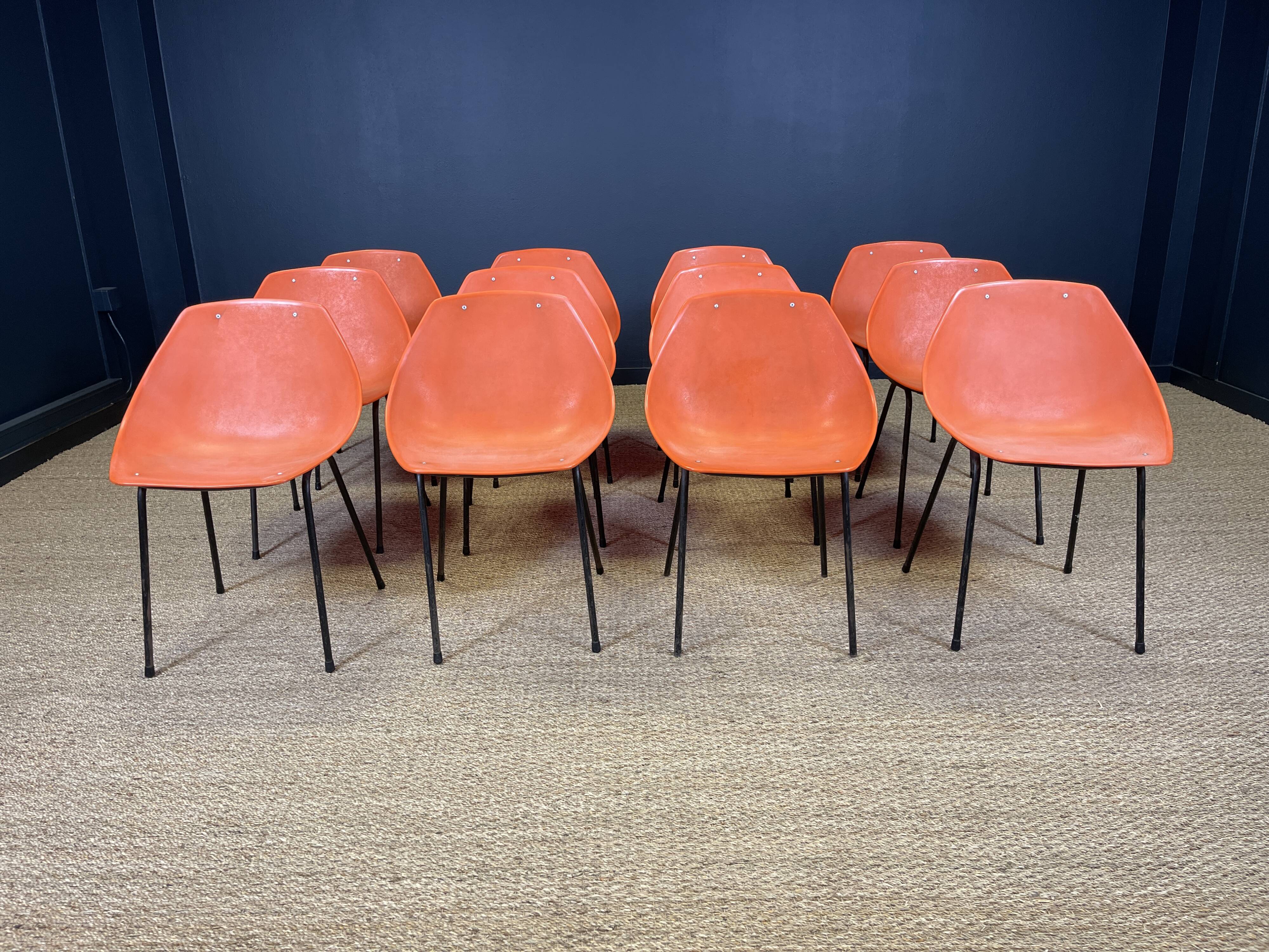 Set of 12 orange Guariche chairs