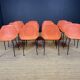 Set of 12 orange Guariche chairs