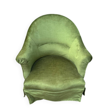Green velvet armchair