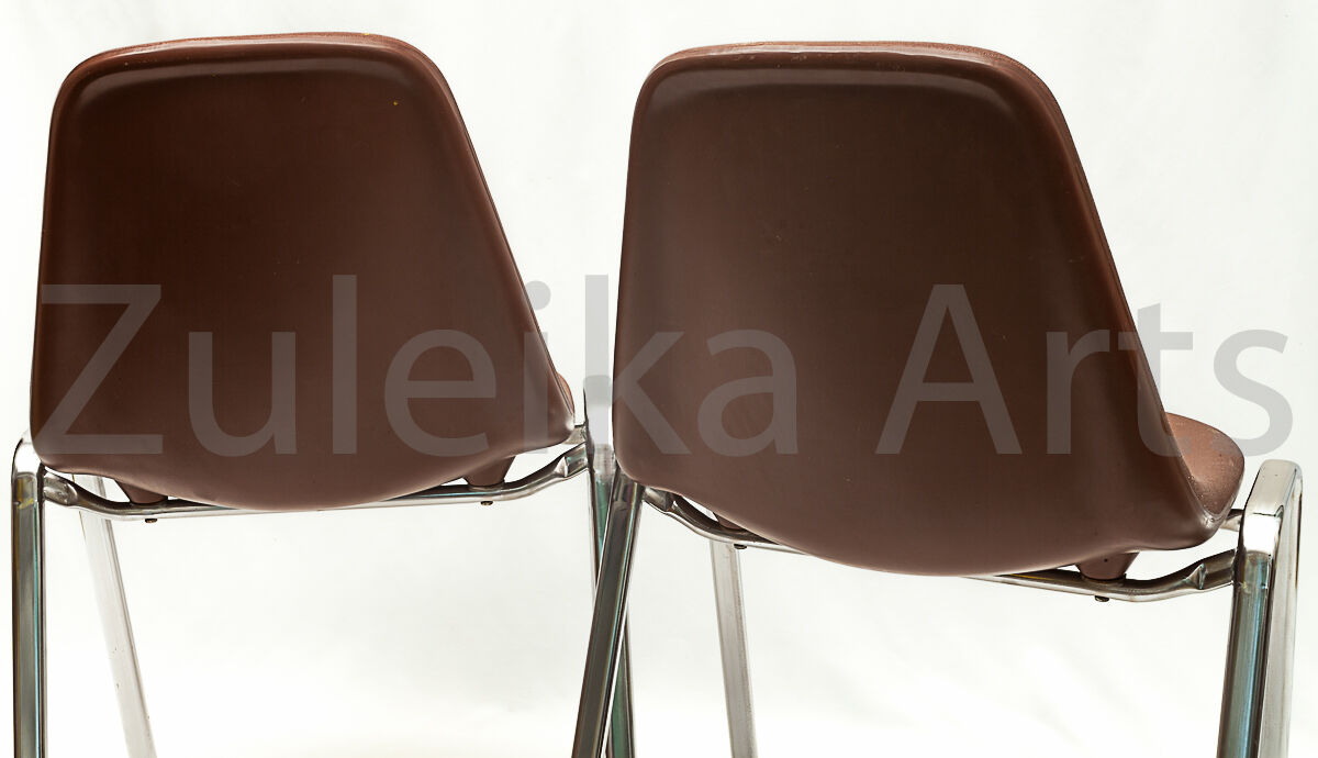 Two "ORLY" chairs by Bruno Pollak