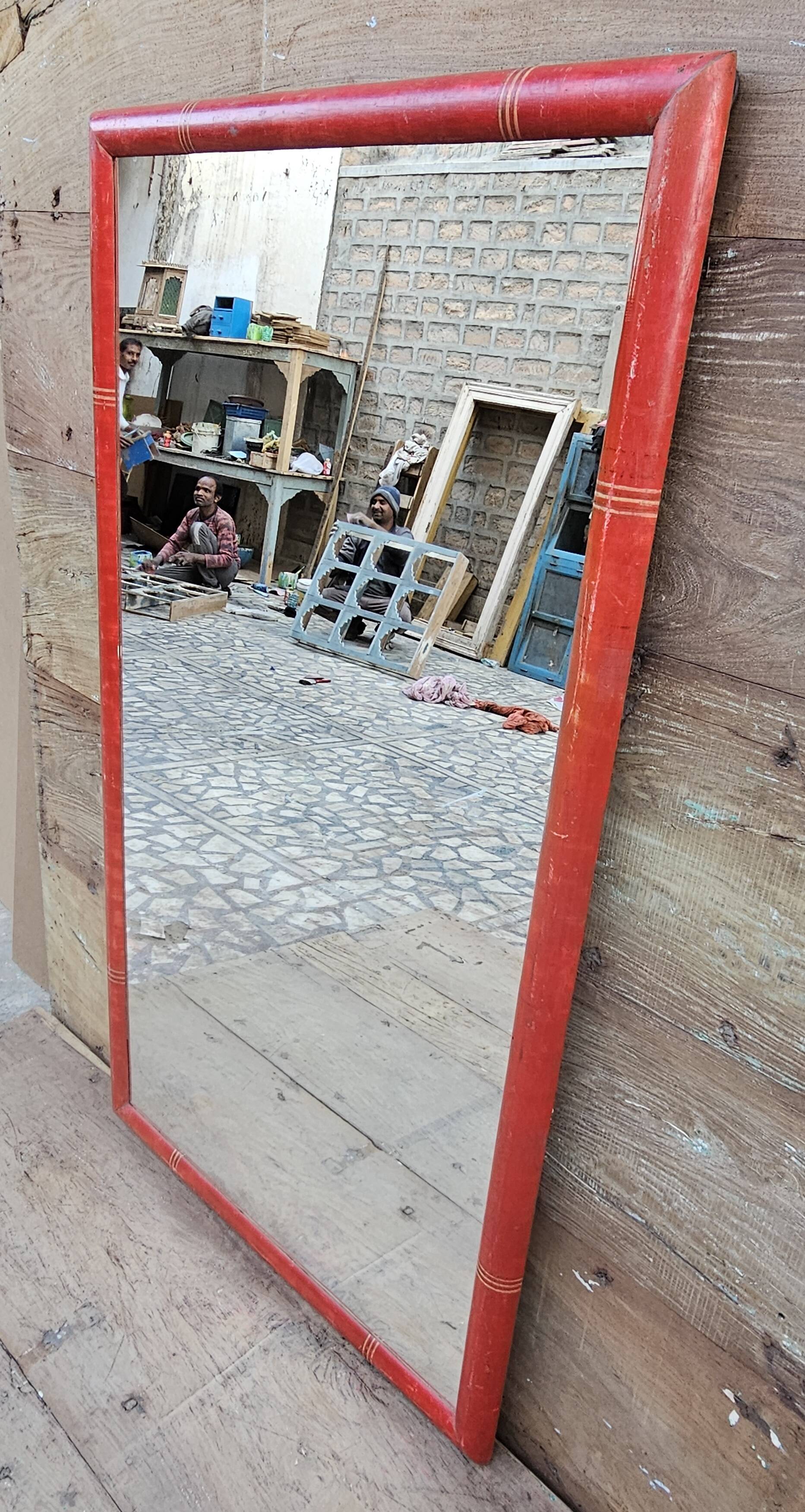 Antique mirror in Burmese teak.