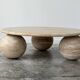 Circular travertine coffee table