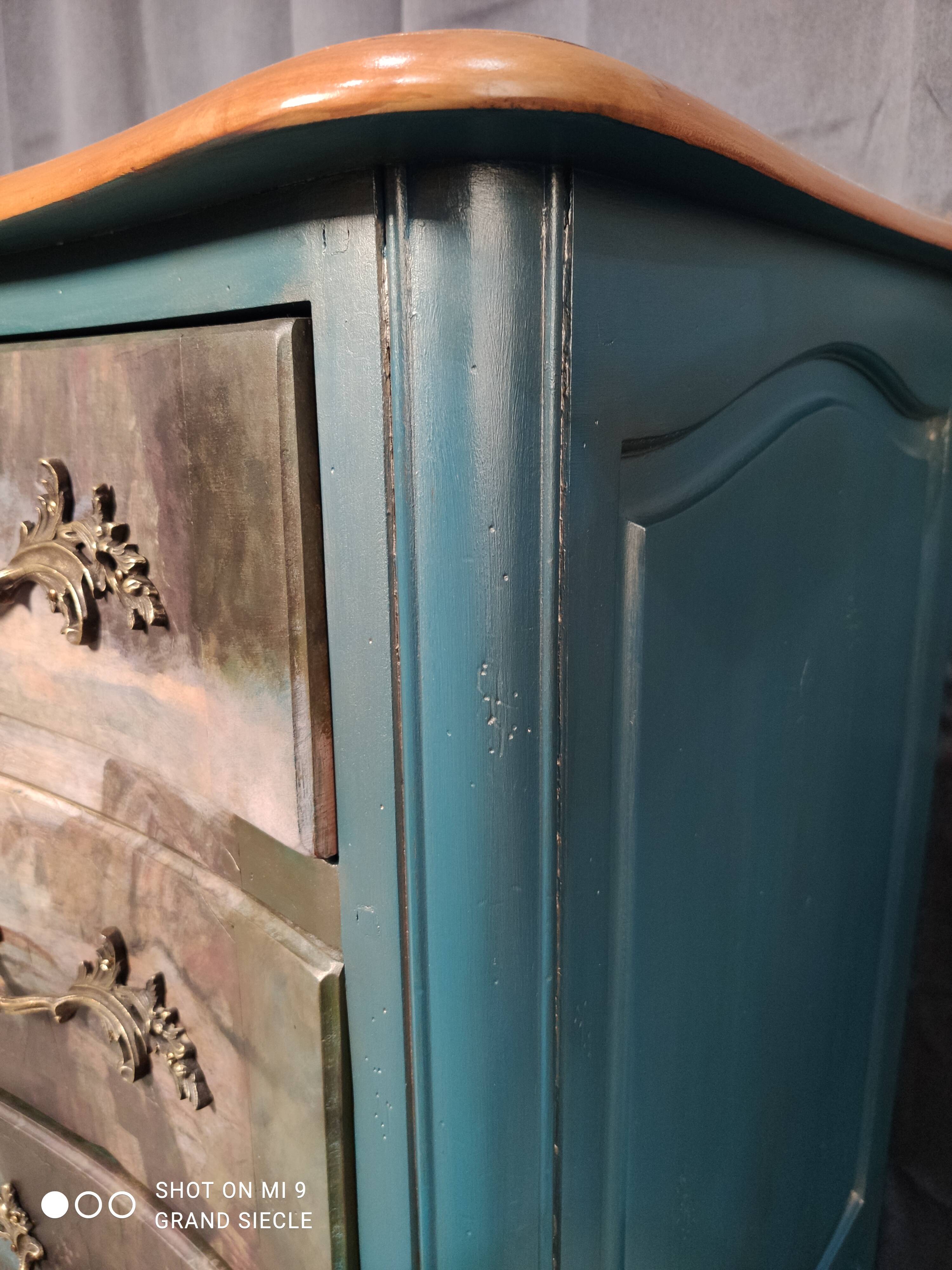 Patinated crossbow chest of drawers