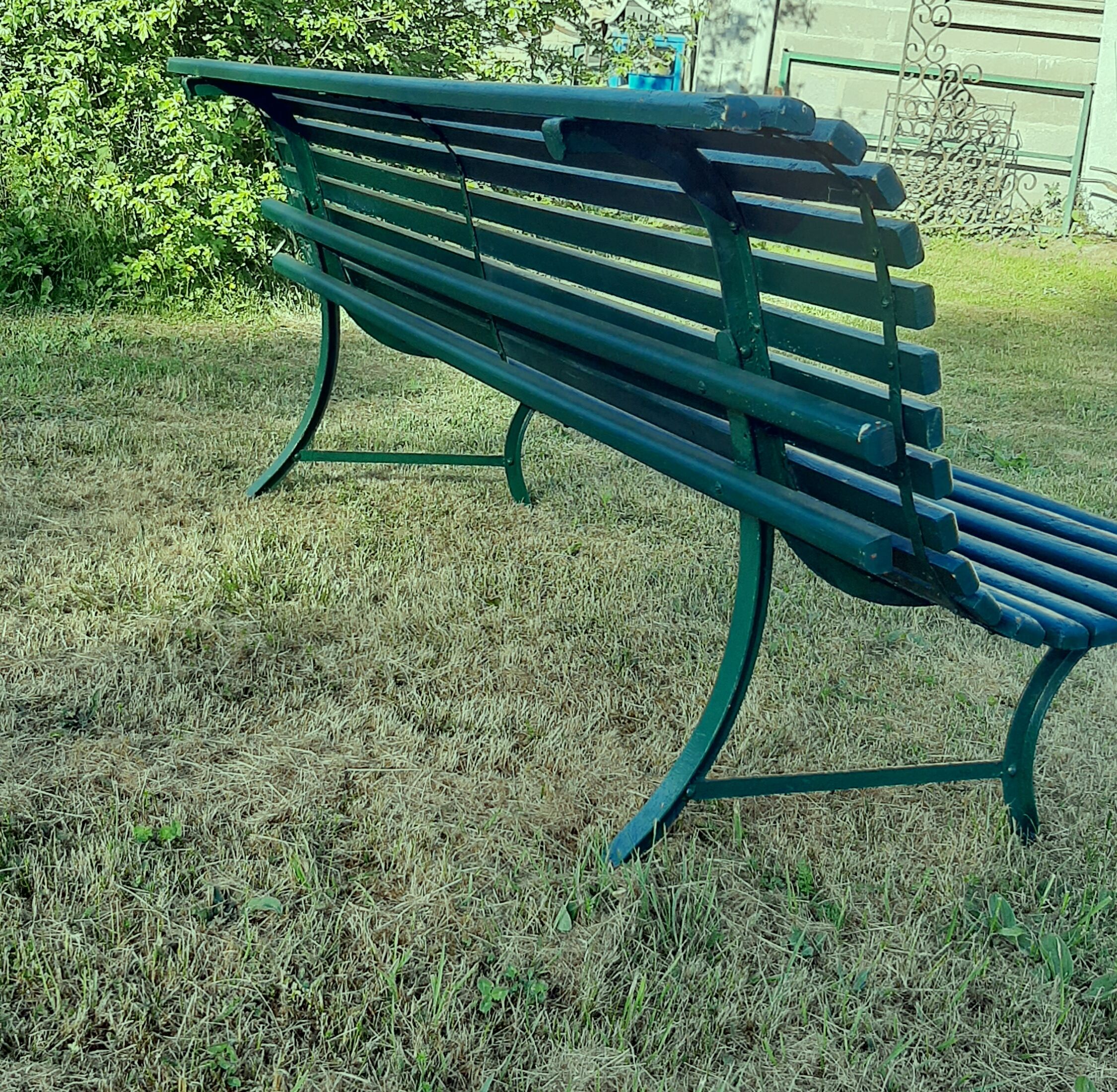 Garden bench with wooden and iron slats