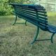 Garden bench with wooden and iron slats