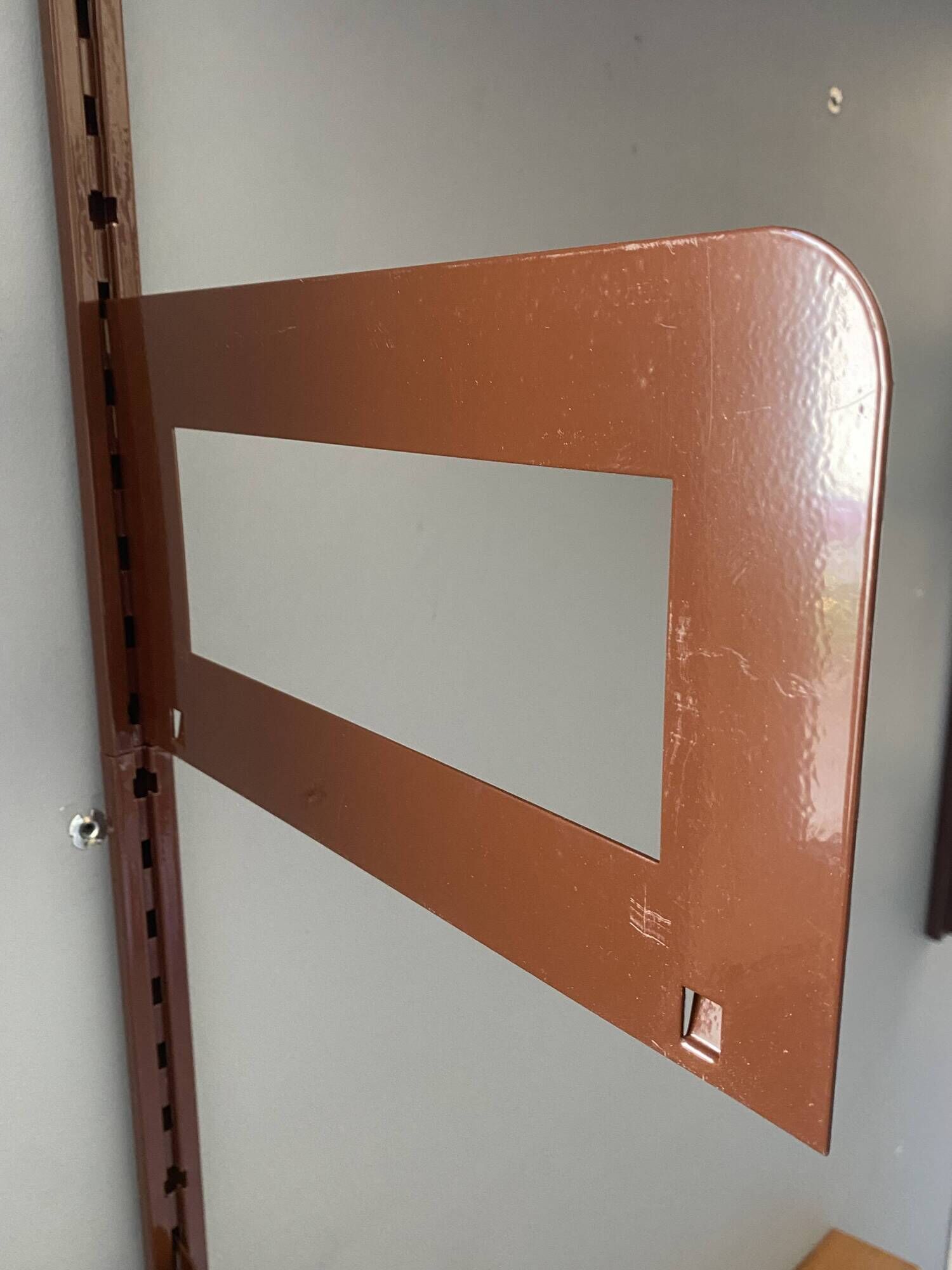 Modular metal wall shelf in brown and beige vintage 70s design.