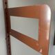Modular metal wall shelf in brown and beige vintage 70s design.