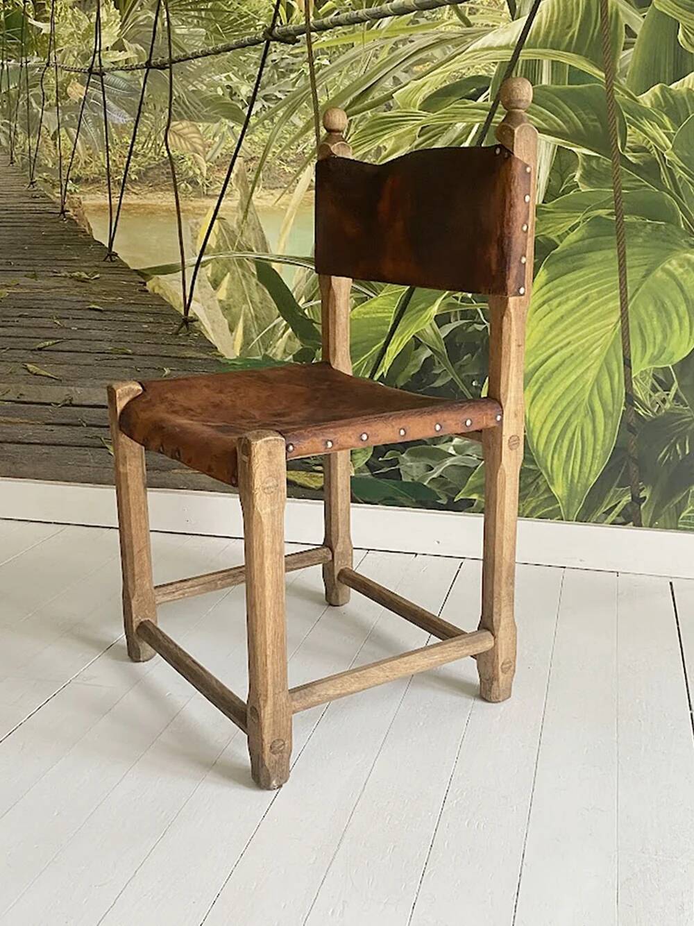 Unique Hungarian handcrafted chair in oak and leather.