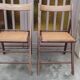 Pair of vintage wooden and cane folding chairs