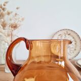 Antique amber glass pitcher