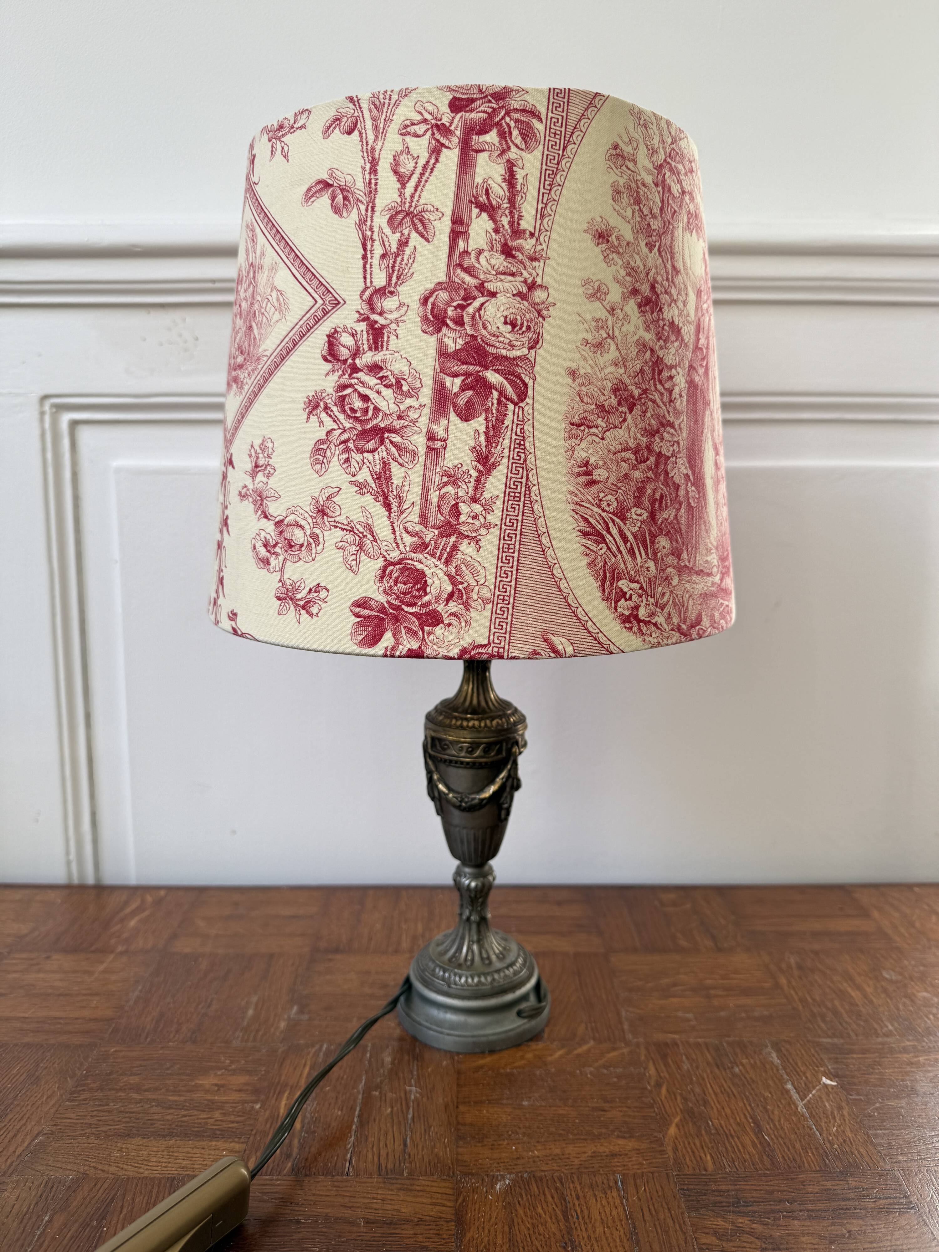 Empire style lamp with a toile de Jouy shade.