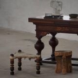 Vintage African artisanal stool, triangular shape with 3 legs, cowhide, 20th century.