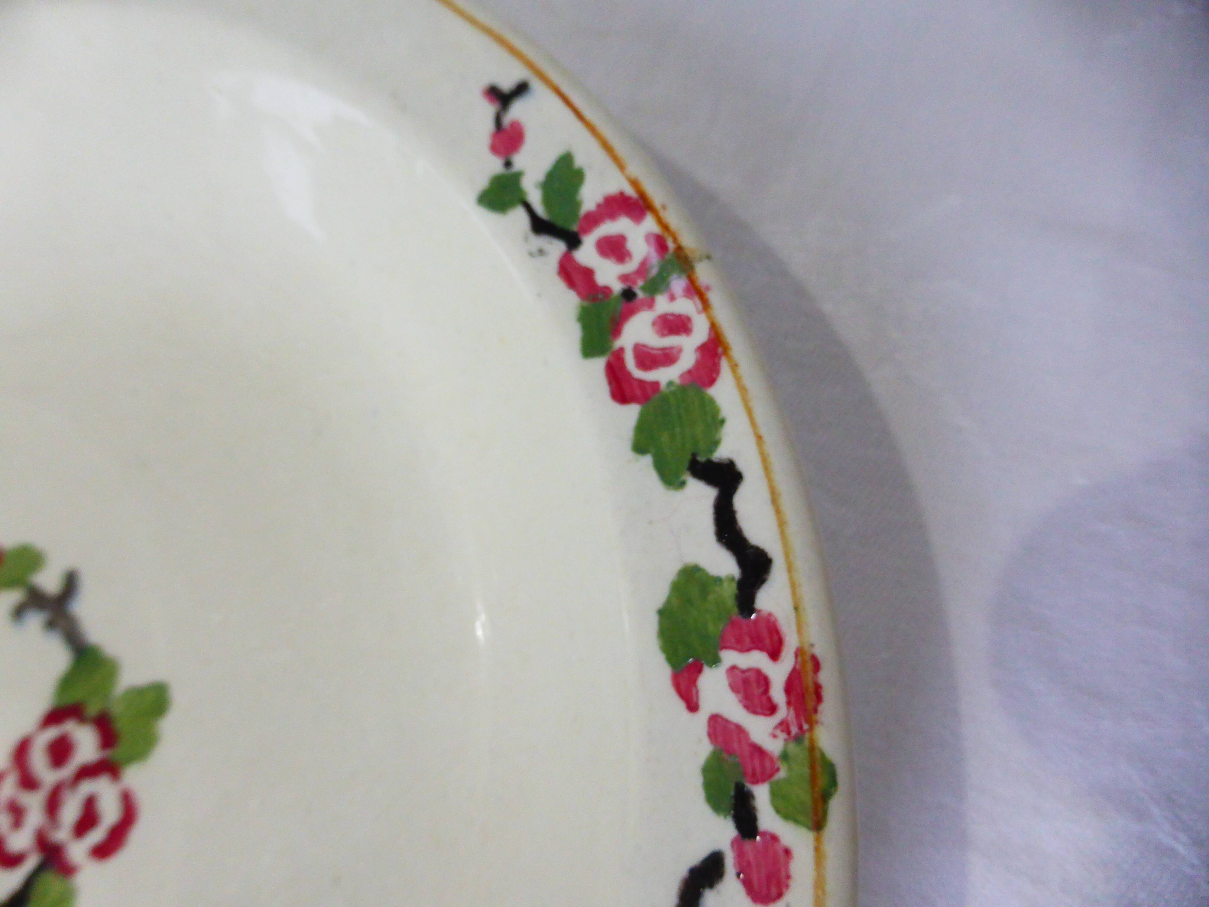 Hollow round dish from Longwy, Aubépine model