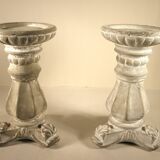 Pair of cement candlesticks