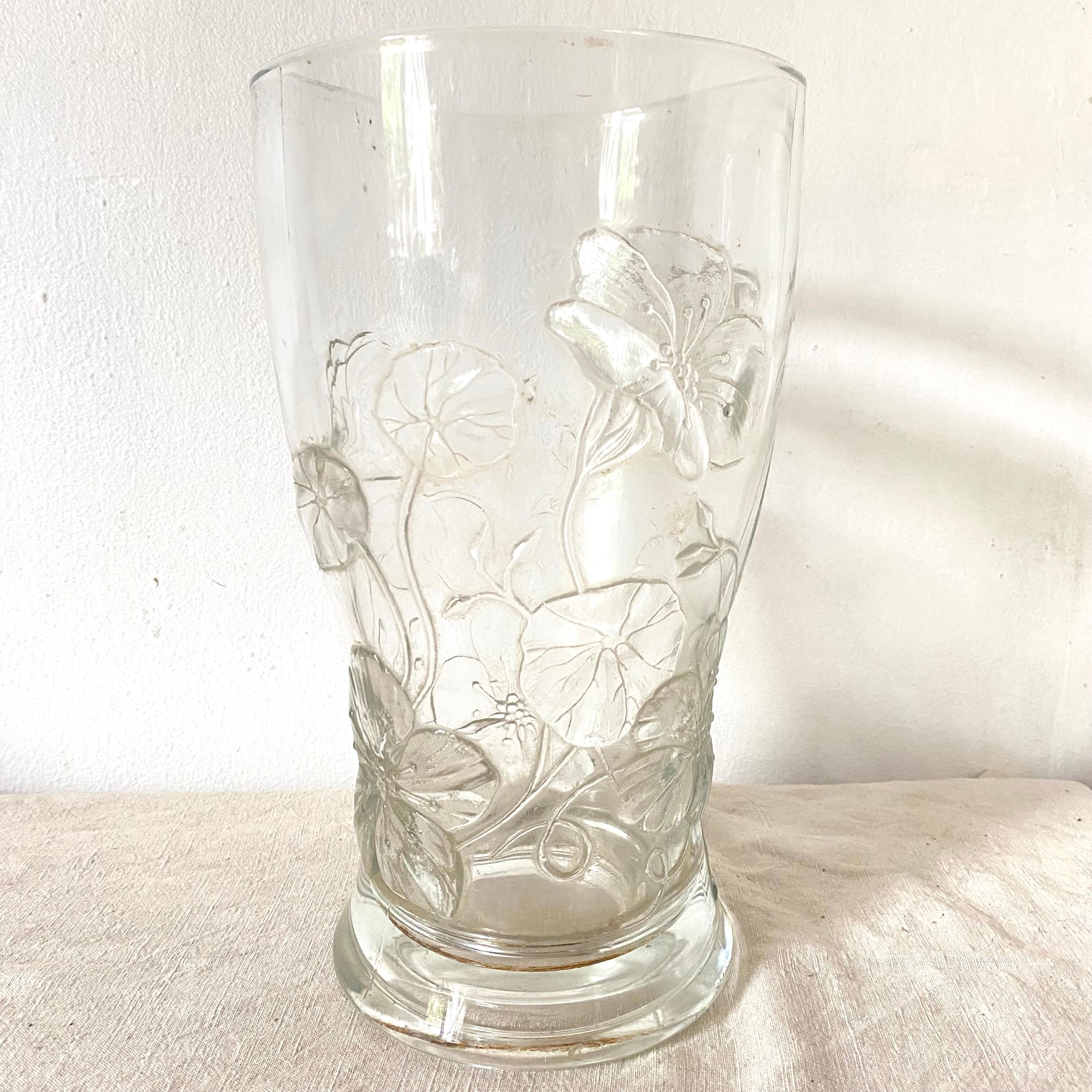 Antique glass vase with embossed nasturtiums