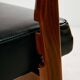 Teak armchair with leather upholstery