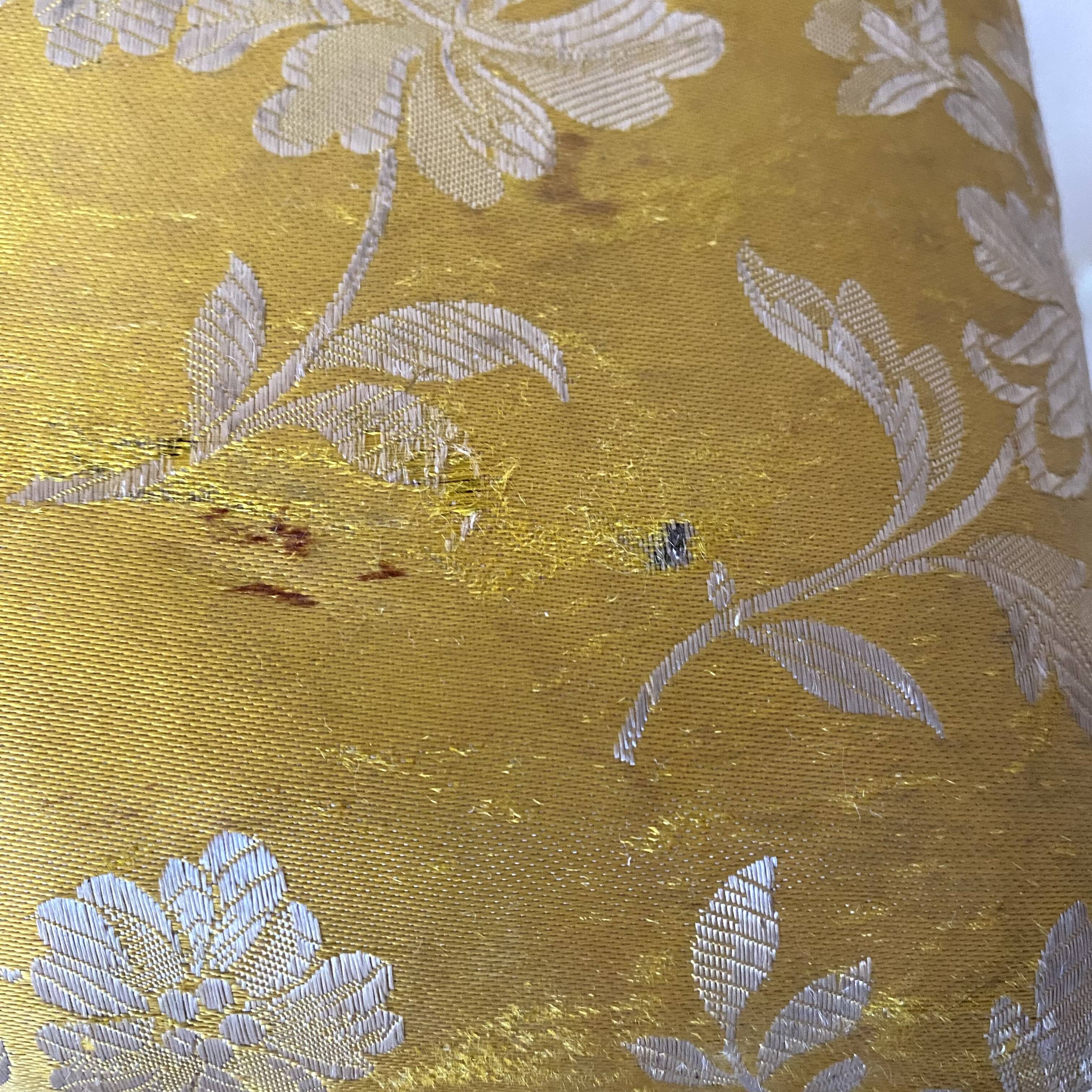 Low stool with antique wood and fabric footrest