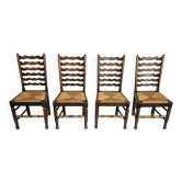 Ensemble de 4 chaises de salle à manger en chêne, rustiques, de ferme, à dossier en échelle avec sièges en jonc, années 1960