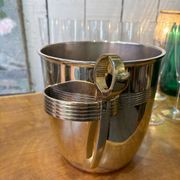 Alpaca champagne bucket from the 1920s with its monopole tongs.