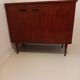 Antique sewing machine cabinet