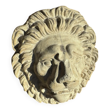 Off-white plaster lion head relief on natural wood panel — Walter De Buck, classical decorative sculpture
