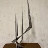 Brutalist candlestick in struck steel