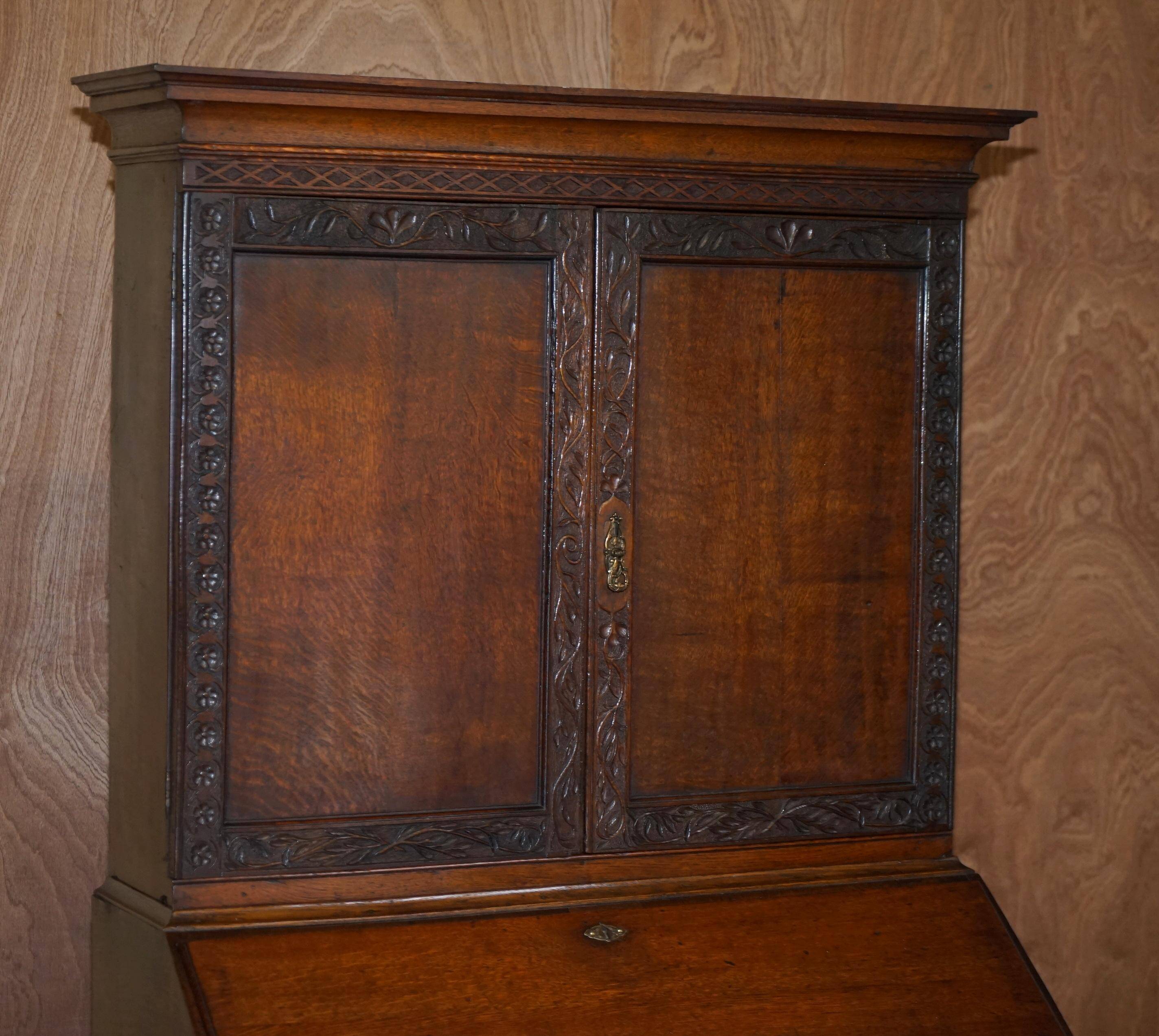 George III oak secretary bookcase circa 1760, Thomas Chippendale style.