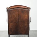 Sheepskin wingback armchair with beautiful deep and warm colours