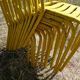 Lot of 11 yellow metallic bistro chairs from the 1950s