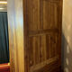 Library with gendarme's hat Louis Philippe era in blond walnut around 1830