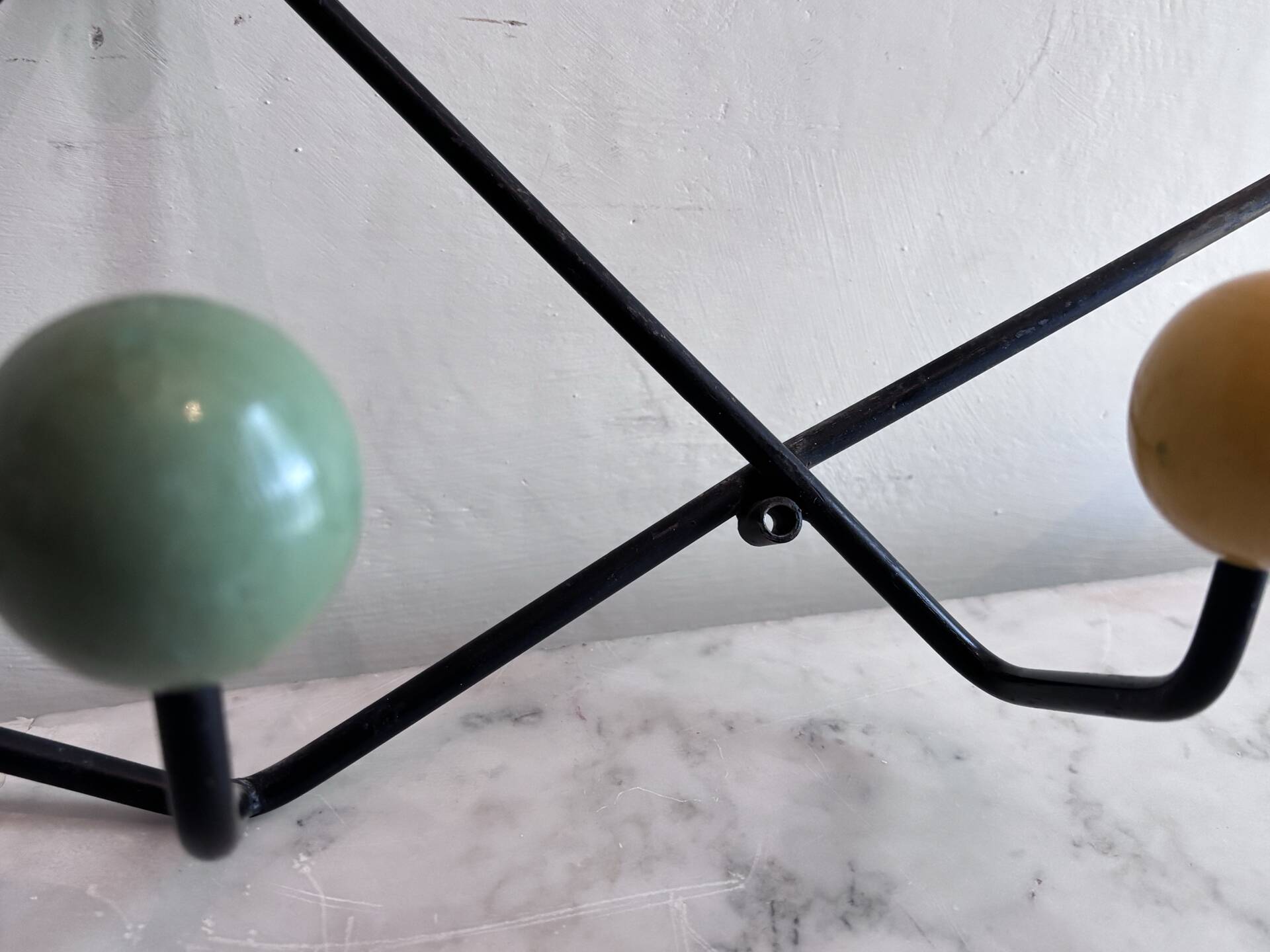 Wall coat rack Roger Feraud, metal and wooden balls.