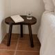 Wooden tripod bedside or occasional table, bean-shaped top.
