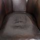 Dark sheepskin club armchair with unique design in English style